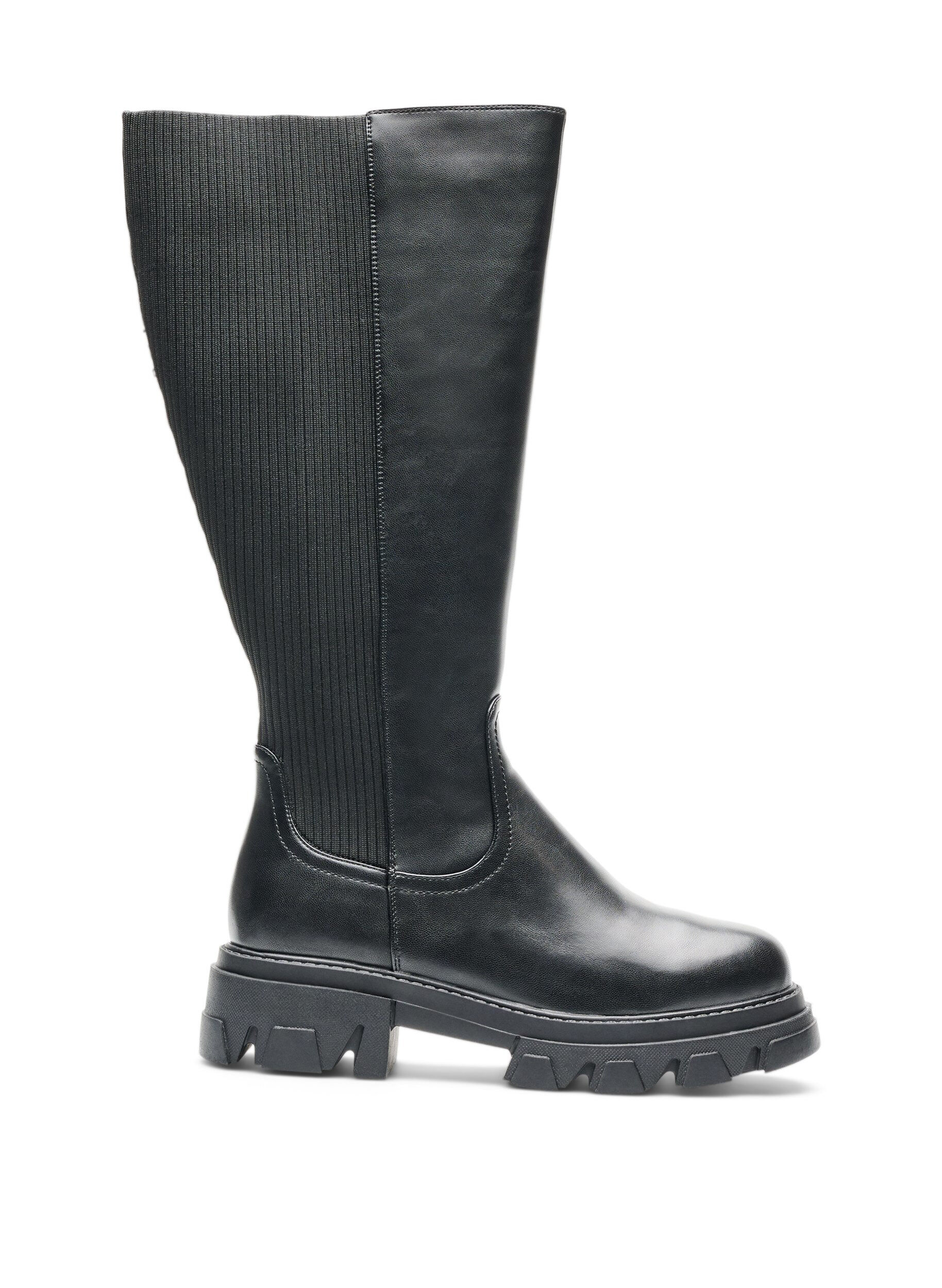 Long boot with ribbed panels