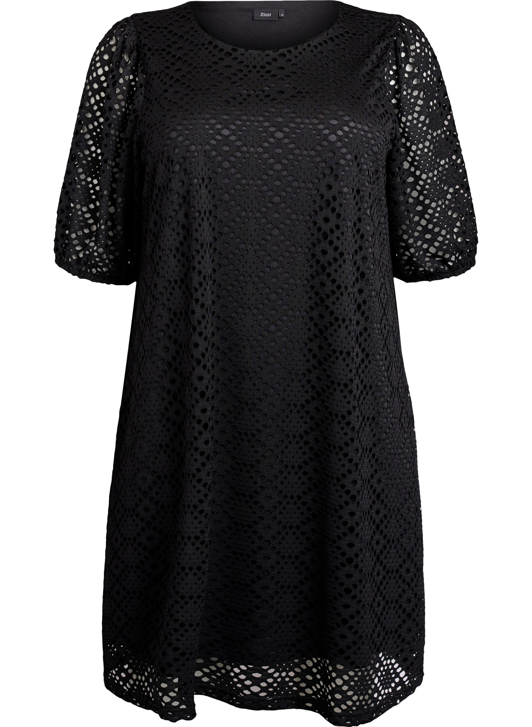 Knee-length dress with eyelet pattern and short sleeves