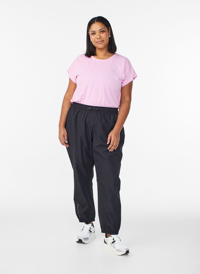 Rain trousers with reflectors, Black, Model image number 1