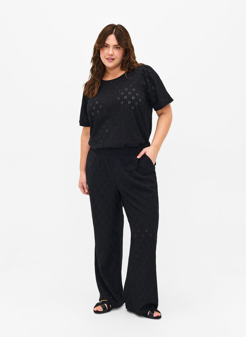 Loose trousers with hole pattern, Black, Model image number 0