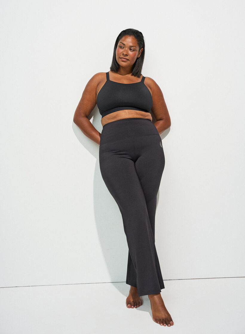 Flared training trousers with high waist, Black, Model image number 1