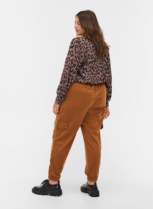 Loose trousers with elasticated trim and pockets, Rubber, Model image number 1