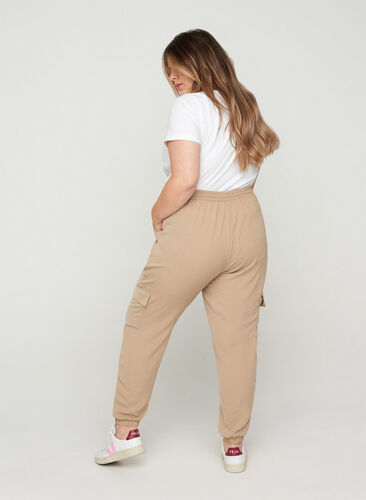 Loose trousers with large pockets, Nomad, Model image number 1