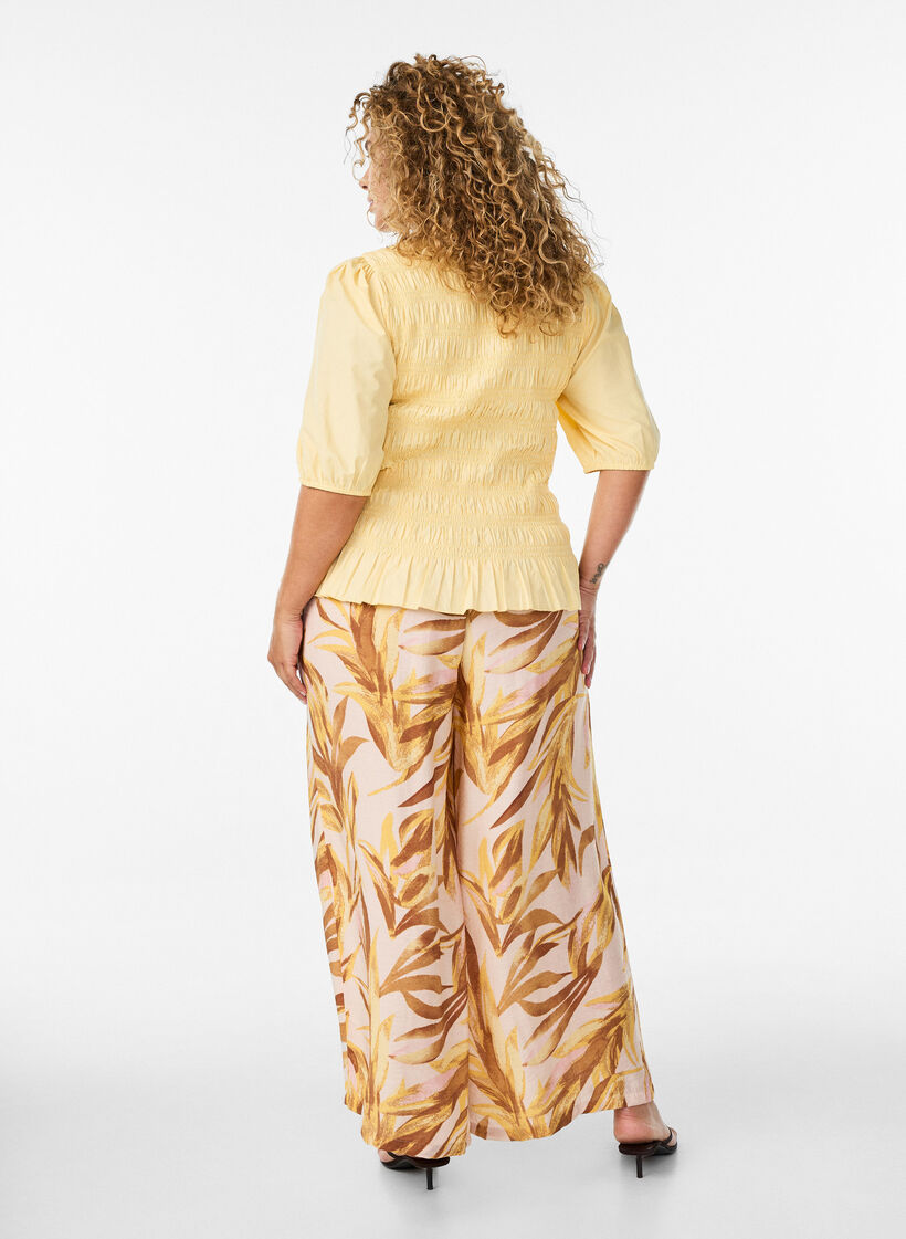 Wide-leg trousers with leaf print and a high elasticated waist, Yellow, Model image number 1