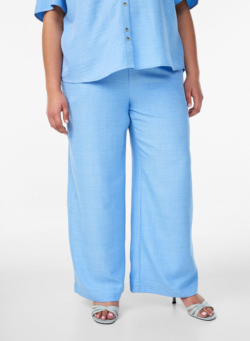 Loose trousers with elasticated waistband and pockets, Light Blue, Model image number 2