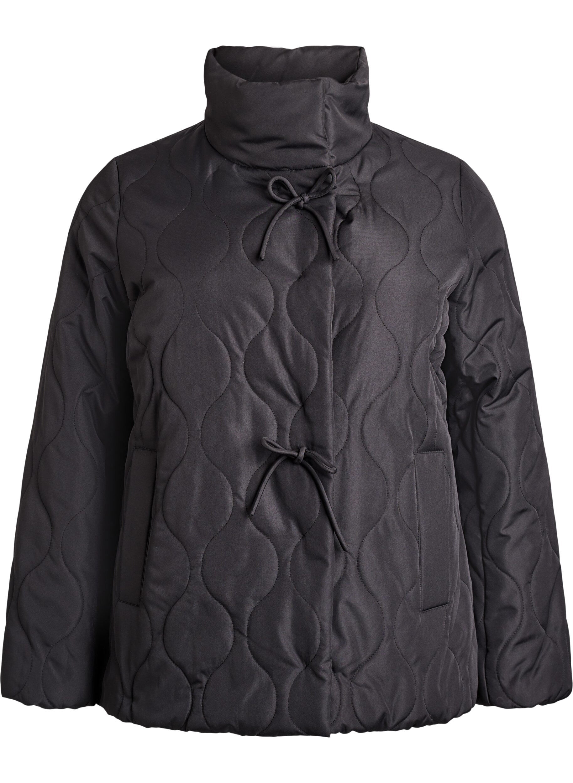 Short quilted jacket with bows and high collar