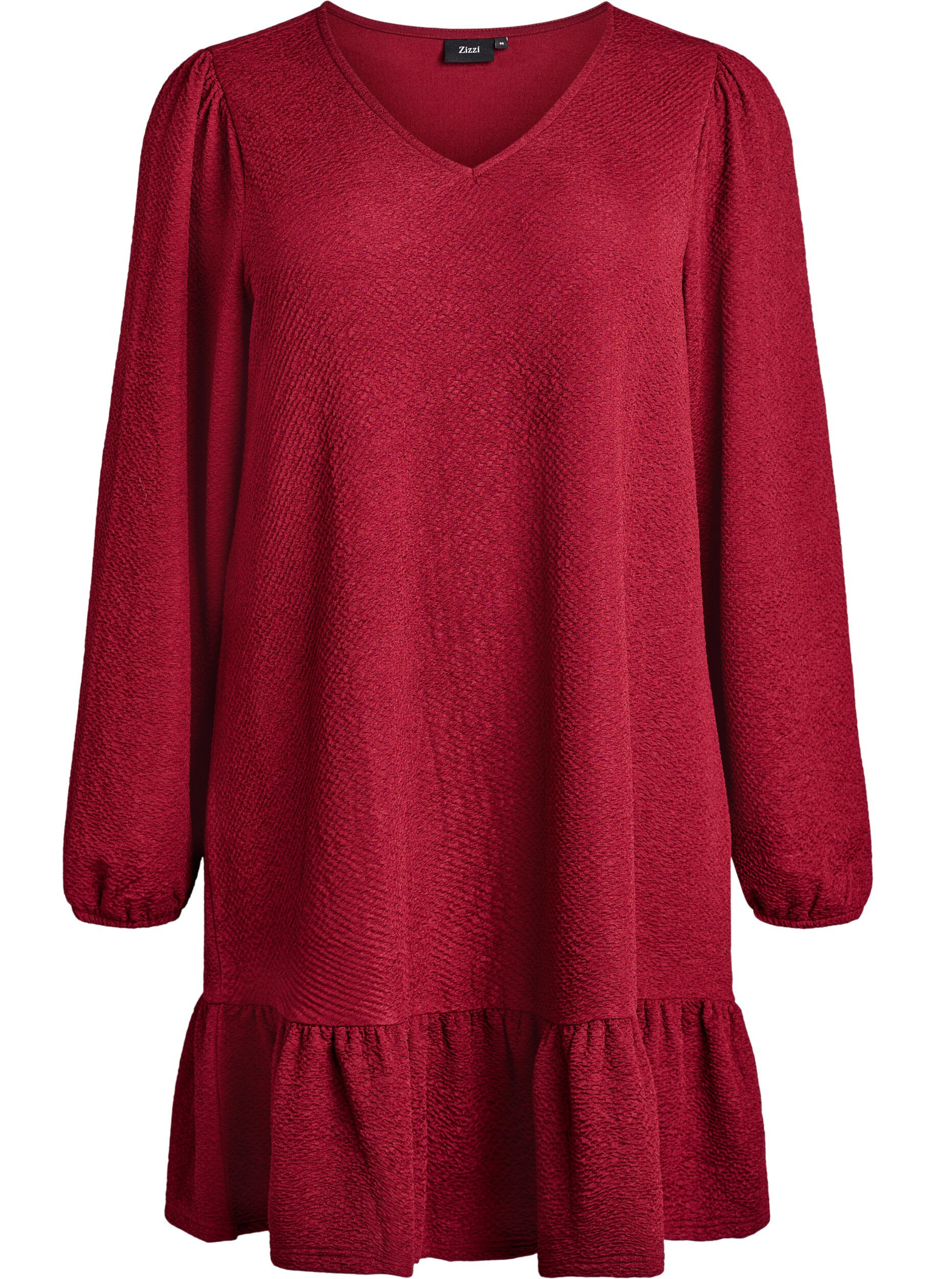 Short textured dress with a ruffle hem