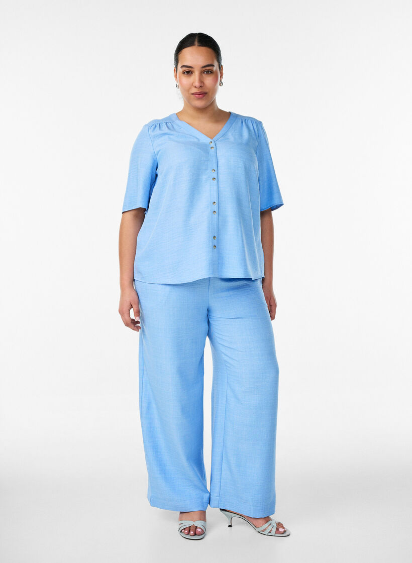 Loose trousers with elasticated waistband and pockets, Light Blue, Model image number 0
