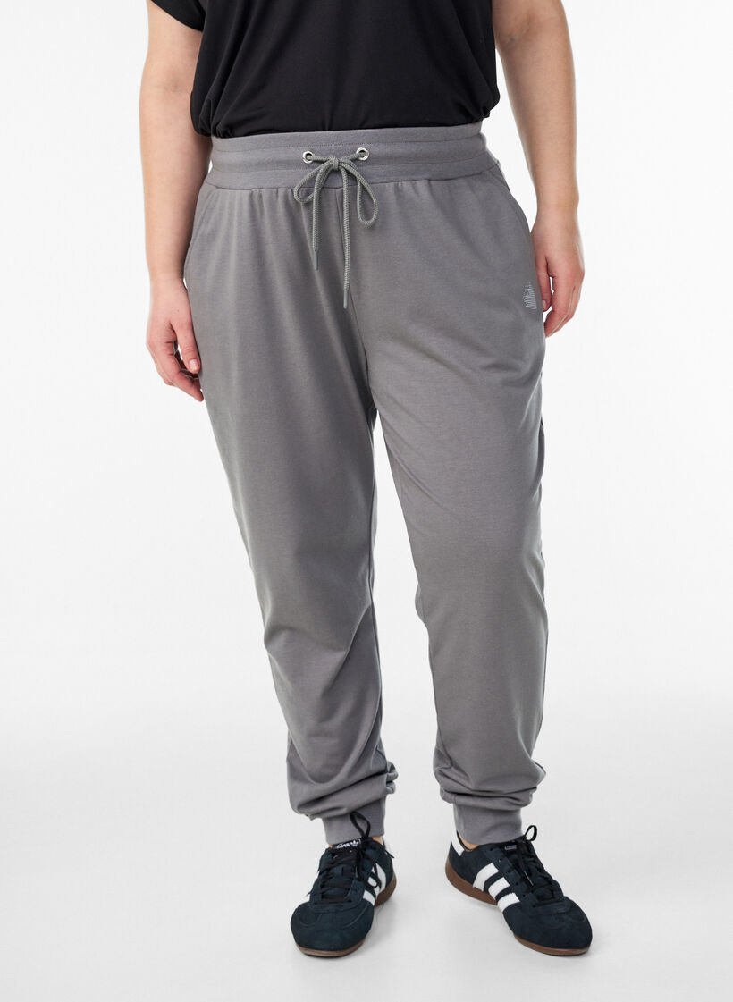 Loose workout trousers with pockets, Grey, Model image number 0