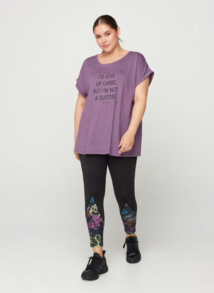 Cropped sports leggings with a floral print, Black, Model image number 0