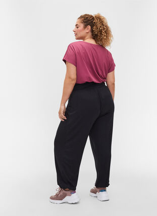 Loose viscose sports trousers, Black, Model image number 1