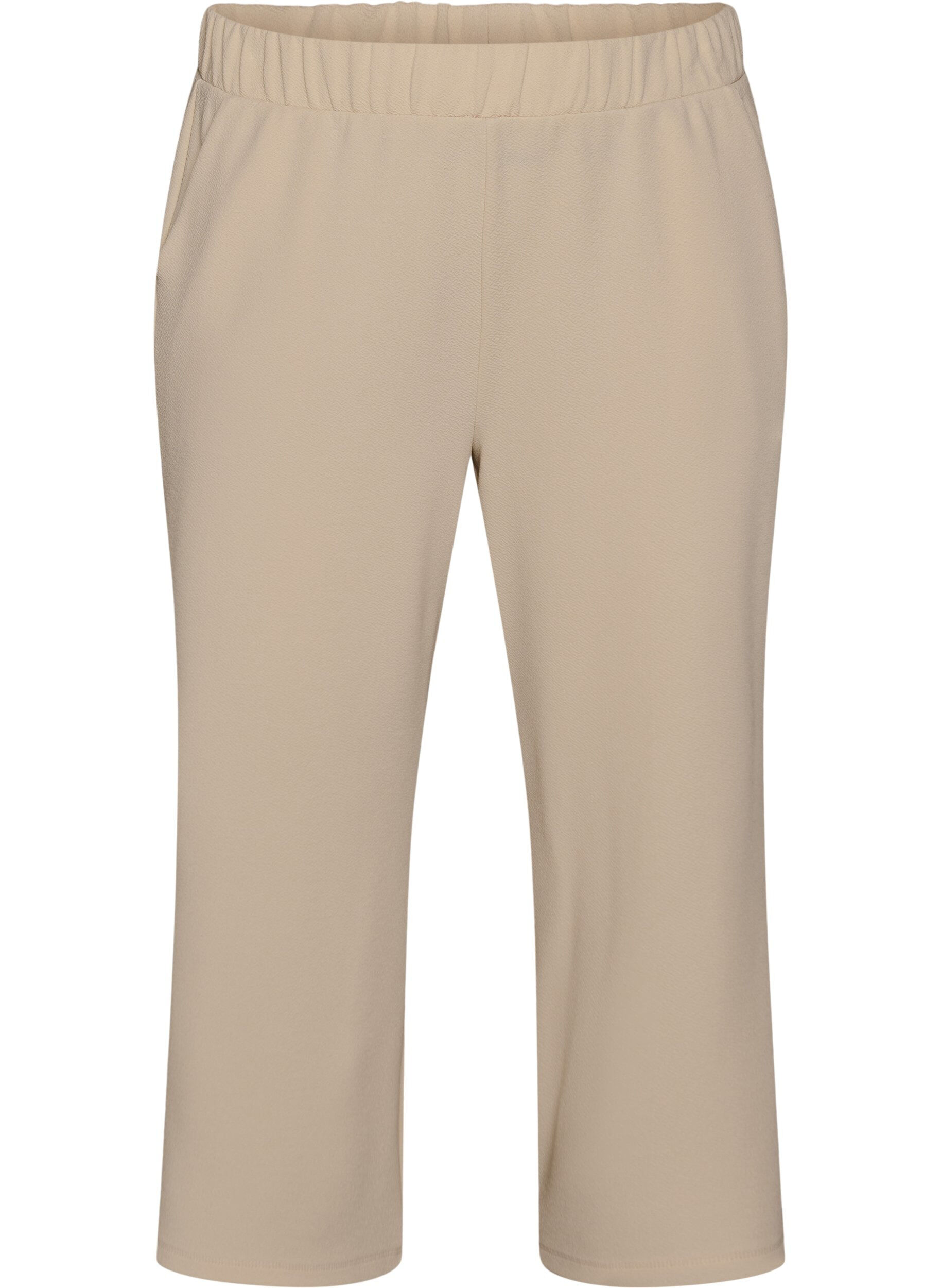 Loose trousers with 7/8 length