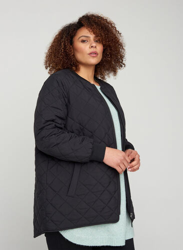 Short quilted jacket with pockets, Black, Model image number 0