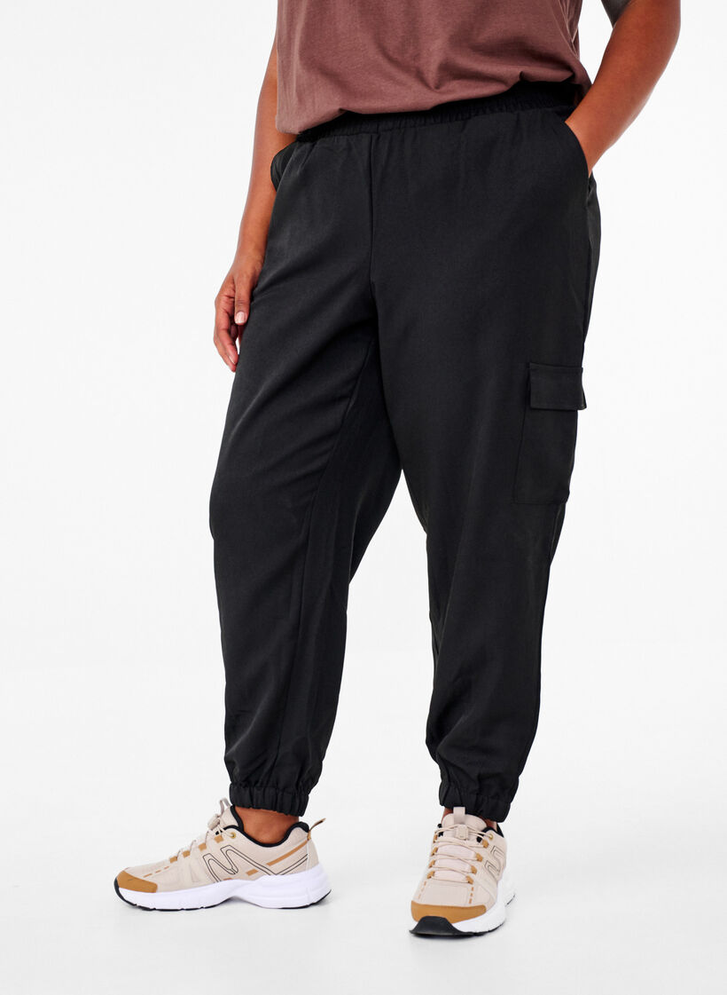 Trousers with cargo pockets and elasticated waist, Black, Model image number 2
