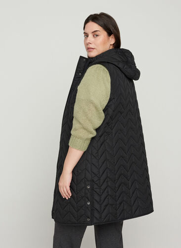 Long quilted vest with hood, Black, Model image number 1