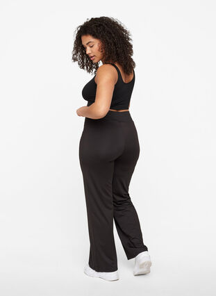Plain-coloured exercise trousers with stretch, Black, Model image number 1