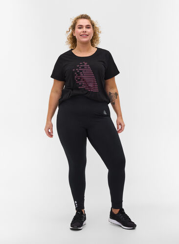 Cropped gym leggings with pocket and reflection, Black, Model image number 0