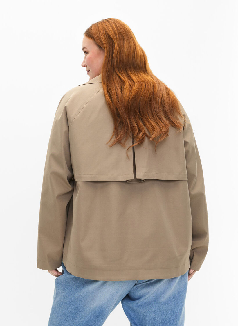 Short trench coat with snap button closure, Coriander, Model image number 1