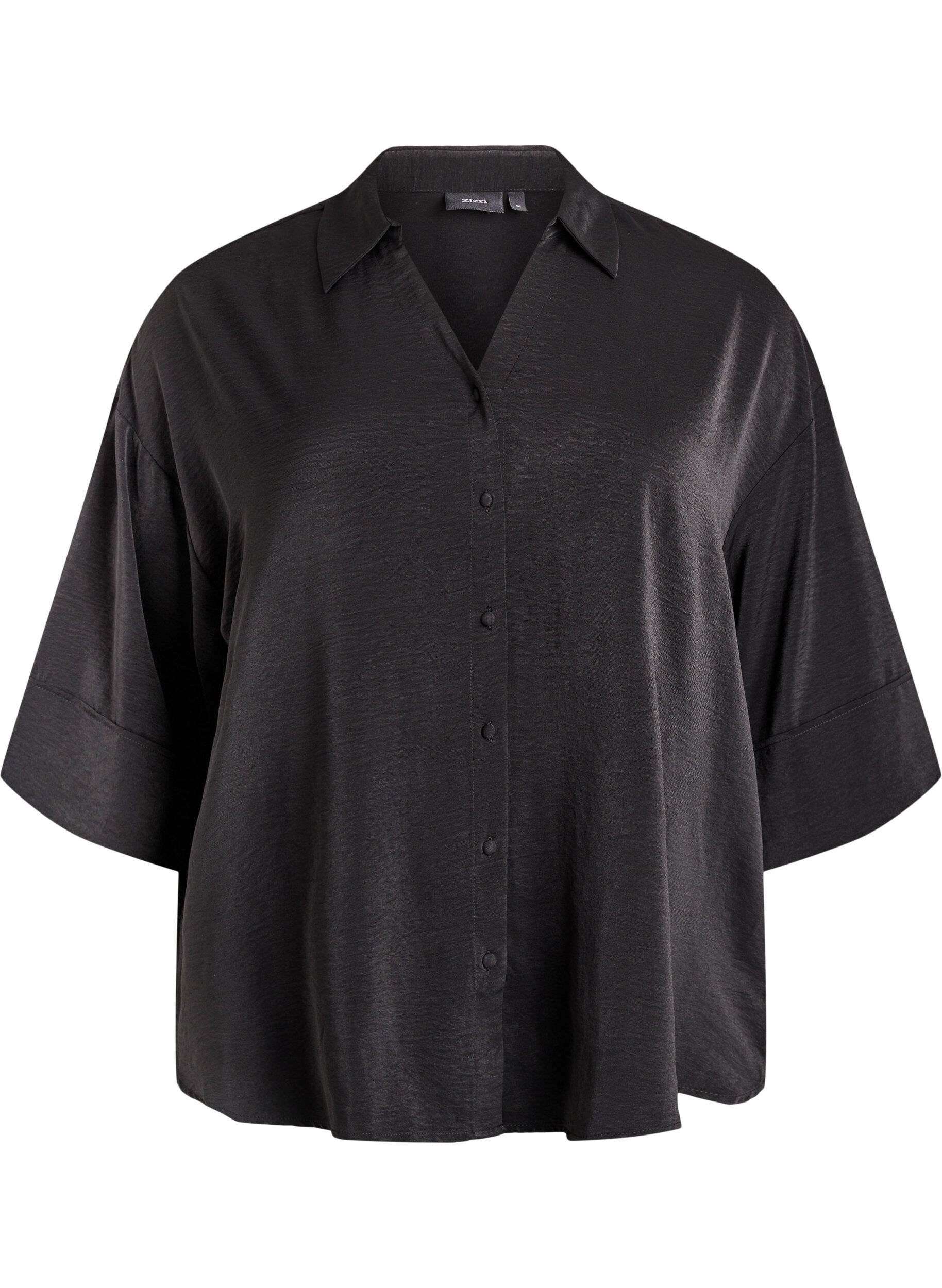 Loose shirt with a v-neck and 3/4 sleeves