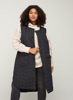 Long quilted vest with pockets, Black, Model image number 0