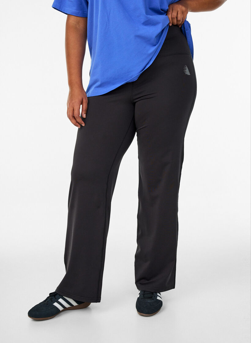Flared training trousers with high waist, Black, Model image number 0