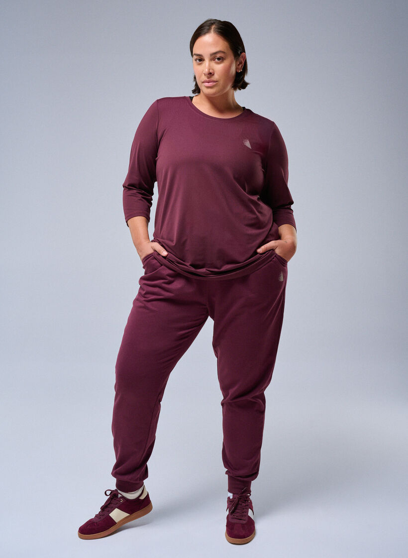 Loose tracksuit trousers with pockets, Red, Image image number 0