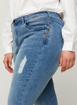 Super slim Amy jeans with distressed look, Blue denim, Model image number 2