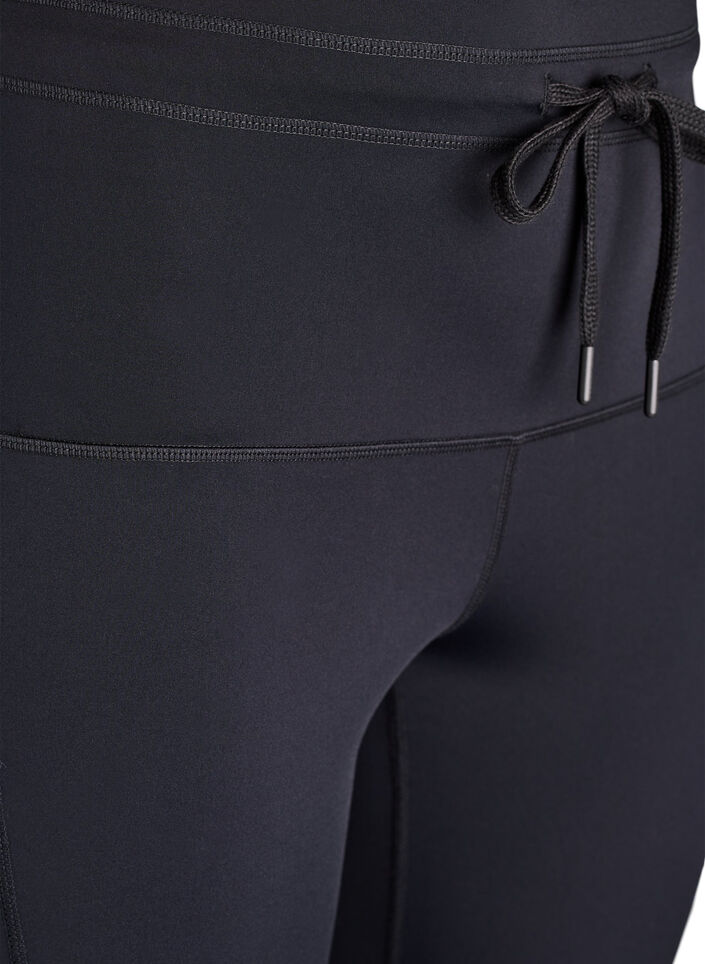 High-waisted 7/8 training tights with a pocket., Black, Packshot image number 2