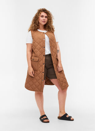 Long quilted vest with button closure and pockets, Rubber, Model image number 2
