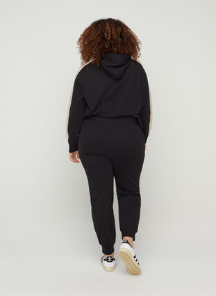 Sweatpants with pockets, Black, Model image number 1