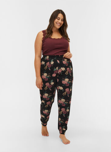 Printed pajama trousers in organic cotton, Black AOP Flower, Model image number 0