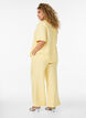 Loose trousers with elasticated waistband and pockets, Yellow, Model image number 1