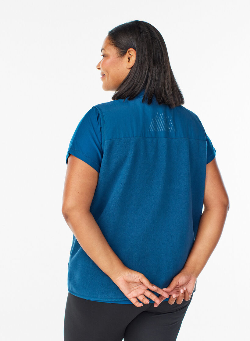 Fleece vest with high collar and pockets, Blue, Model