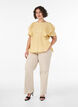 Blouse with smocked texture and ruffle sleeves, Yellow, Model image number 1