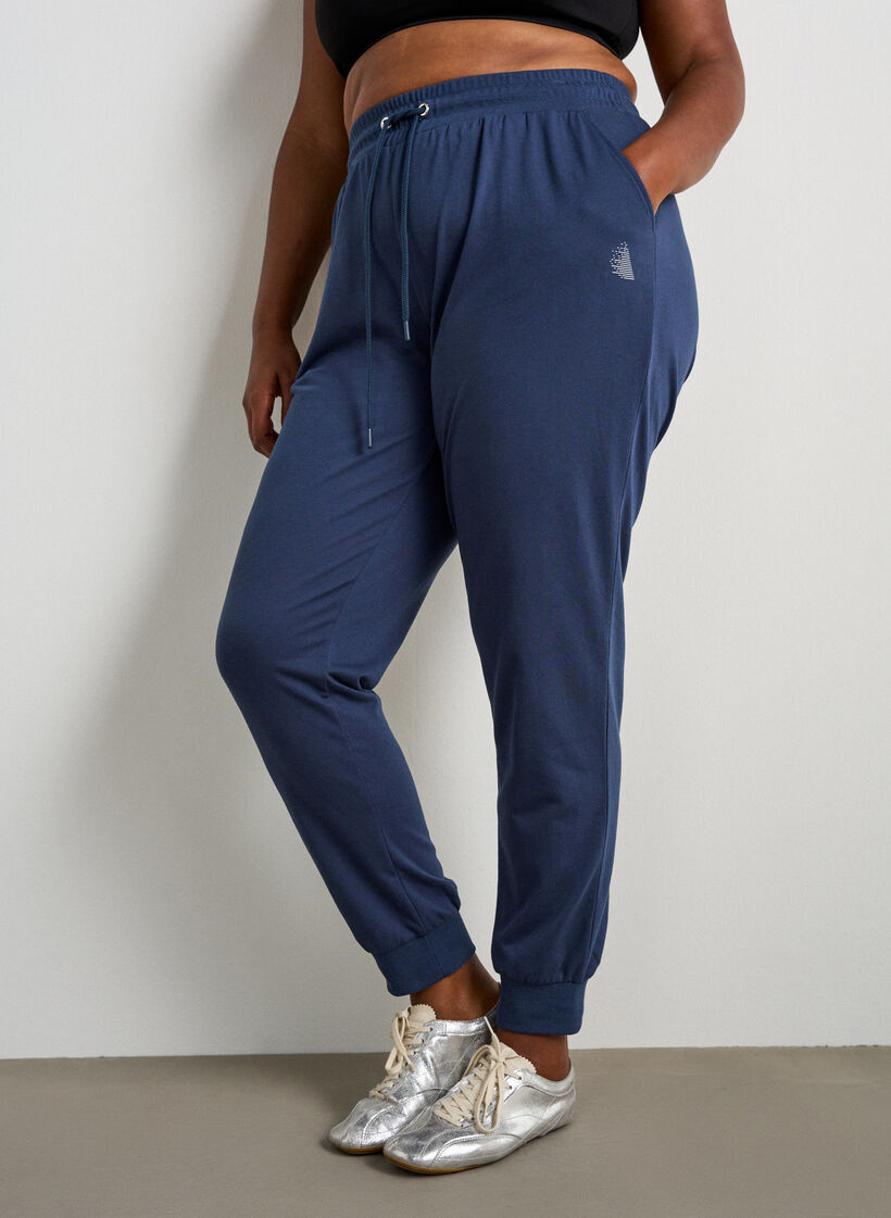 Loose tracksuit trousers with pockets, Blue, Model image number 2