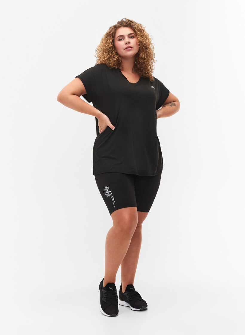 Tight-fitting workout shorts with logo, Black, Model image number 2