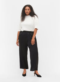 Loose trousers with pockets and elasticated edge, Black, Model