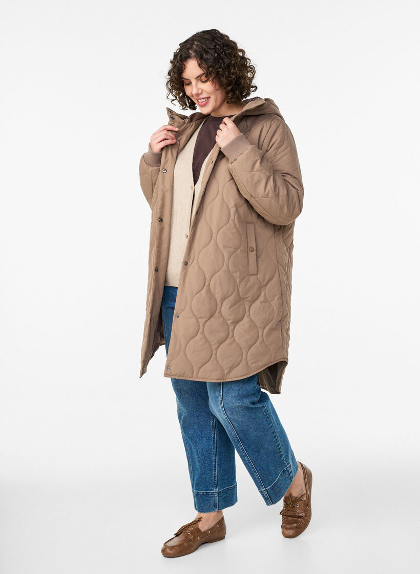 Mid-length quilted jacket with a hood, Brown, Model