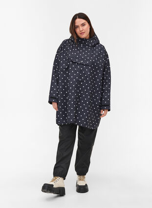 Rain poncho with hood and print, Black w/ white dots, Model image number 2