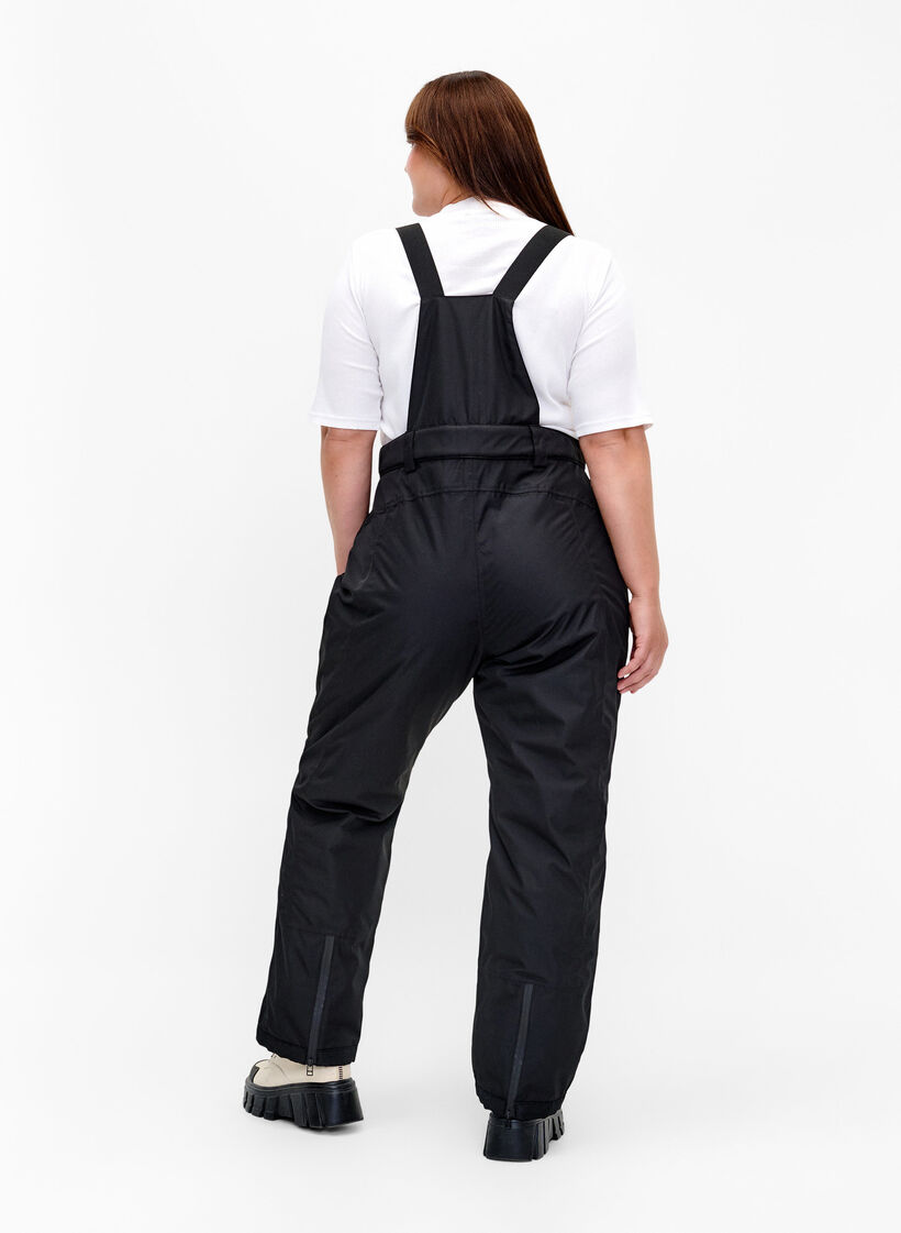 Ski pants with suspenders, Black, Model image number 1