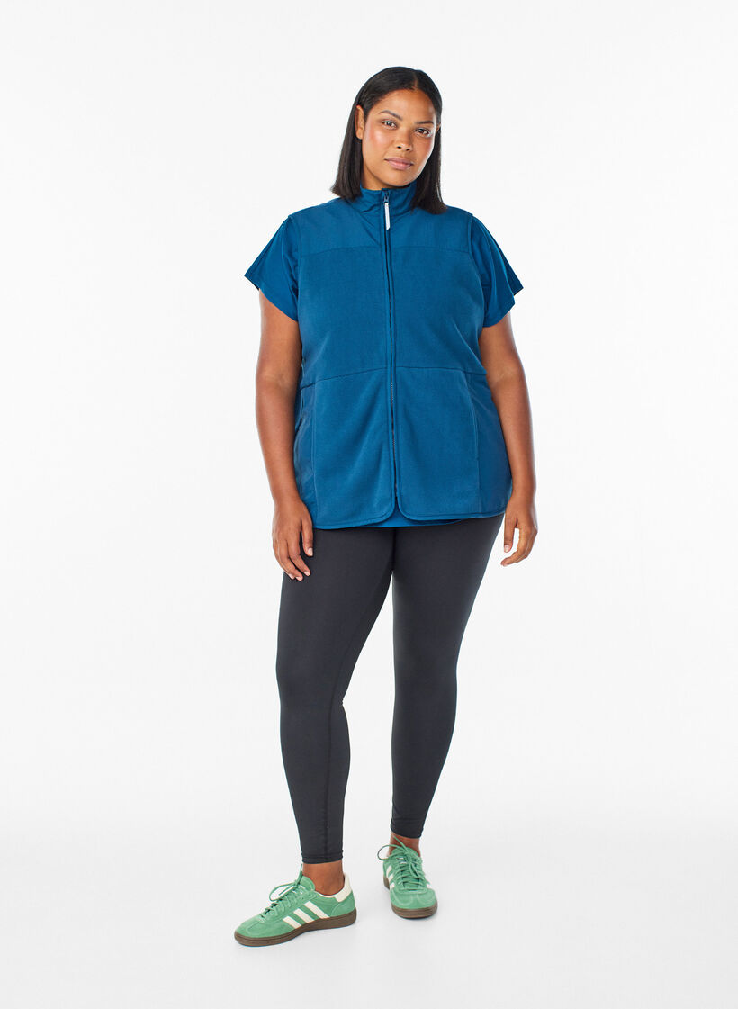 Fleece vest with high collar and pockets, Blue, Model