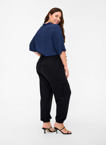 Cargo trousers with big pockets, Black, Model image number 1