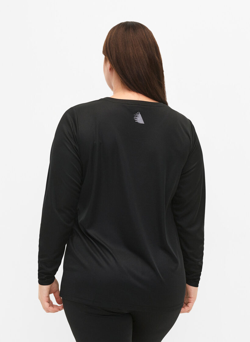 Long-sleeved training shirt with reflective print, Black, Model image number 1