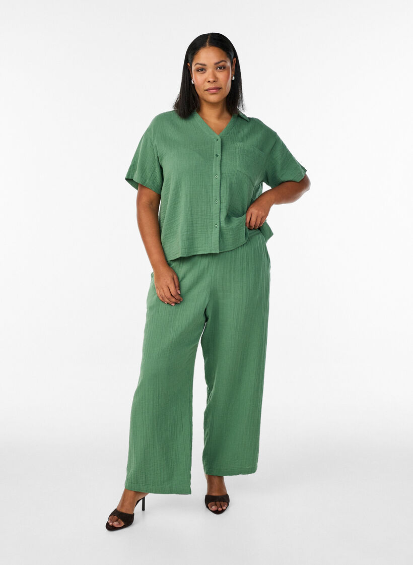 High-waisted cotton muslin trousers with loose legs, Green, Model image number 0
