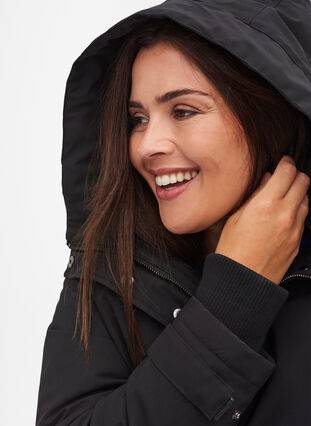 Waterproof winter jacket with a hood and pockets, Black, Model image number 2