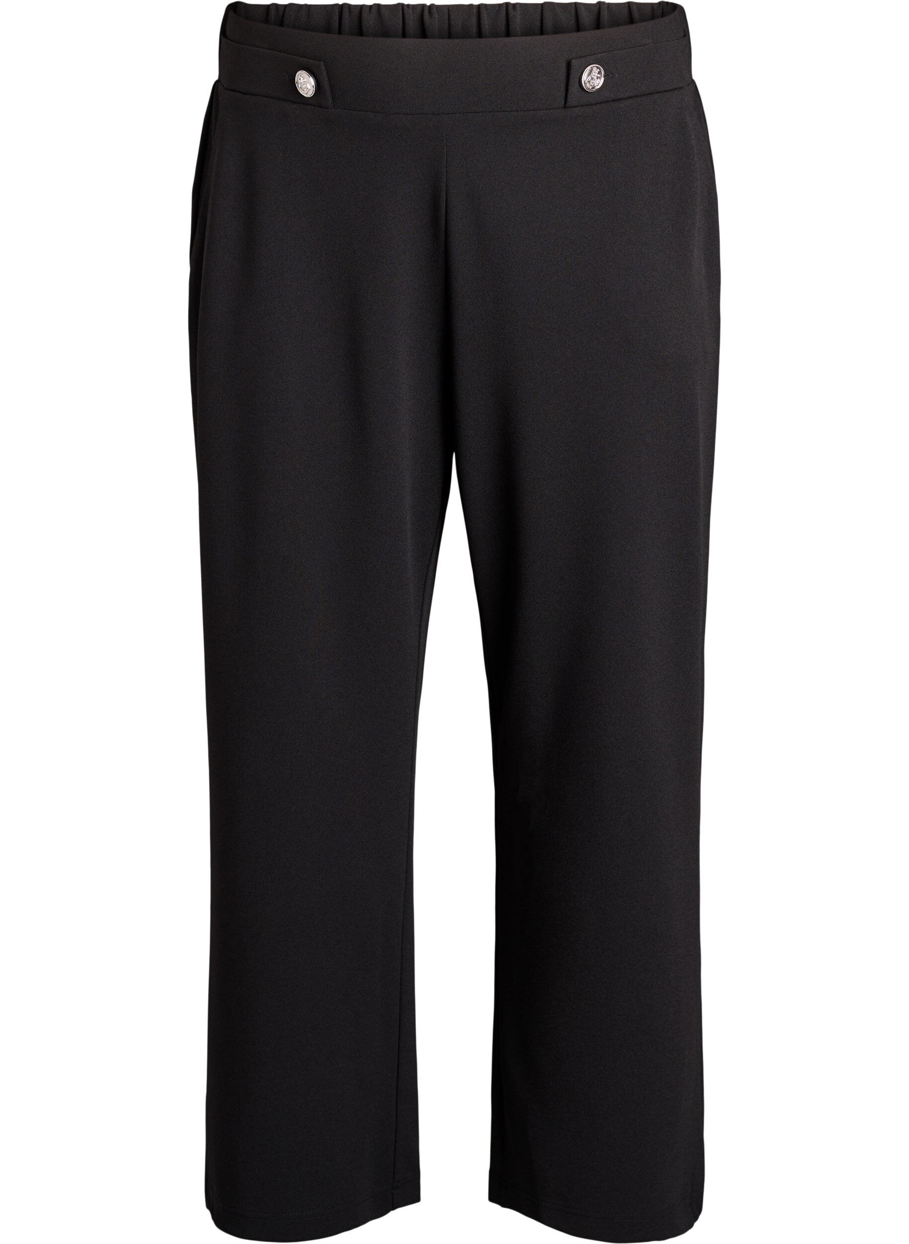 Loose trousers with pockets