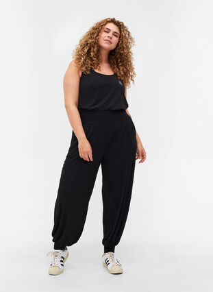 Loose exercise trousers in viscose with pockets, Black, Model image number 2