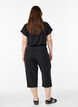 High-waisted capri training trousers, Black, Model image number 2
