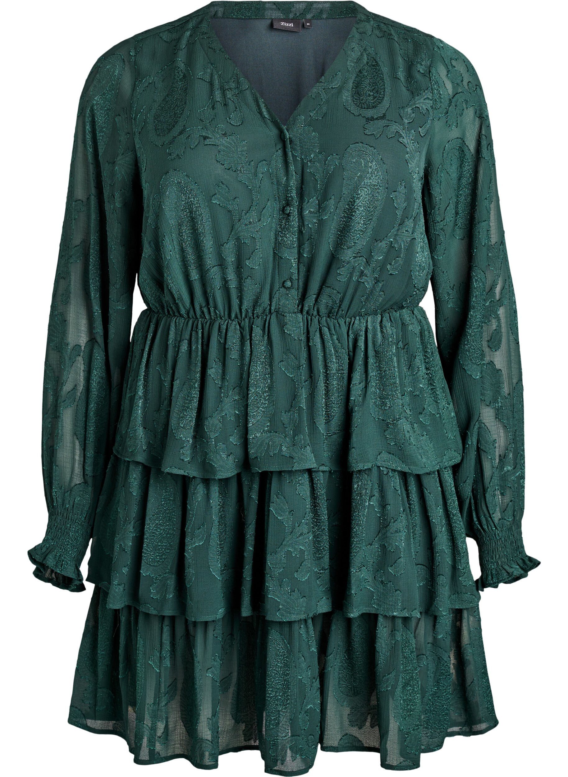 Short dress with ruffles and a textured pattern