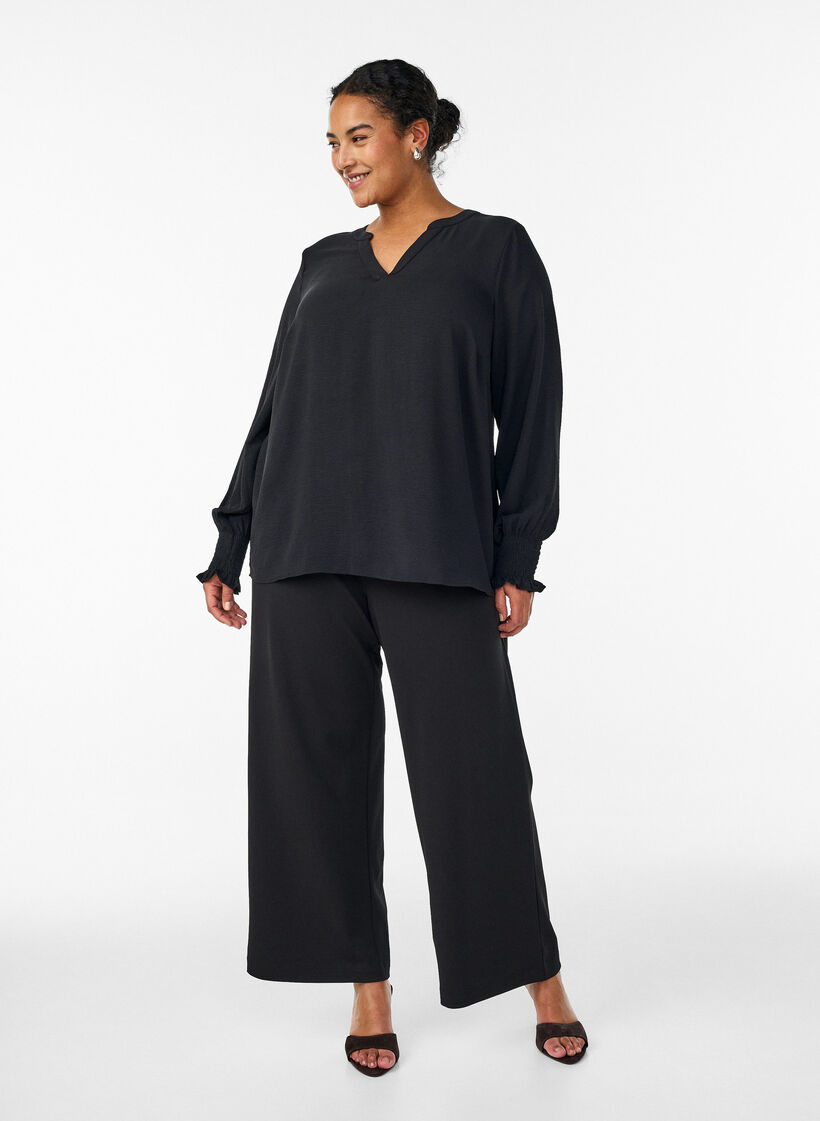 Blouse with smock cuffs and V-neck, Black, Model image number 1